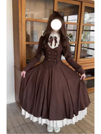 Model holding out the full brown skirt of the three-piece Lolita outfit