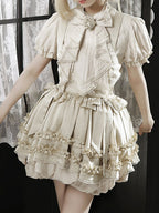 Bow and Ruffle Detail Bubble Skirt with Cross Straps in Beige - Unknown Star | CoyBunny